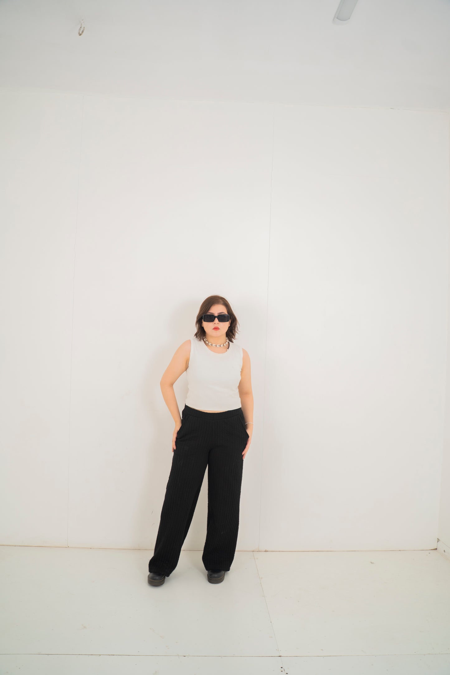 Black quilted trousers