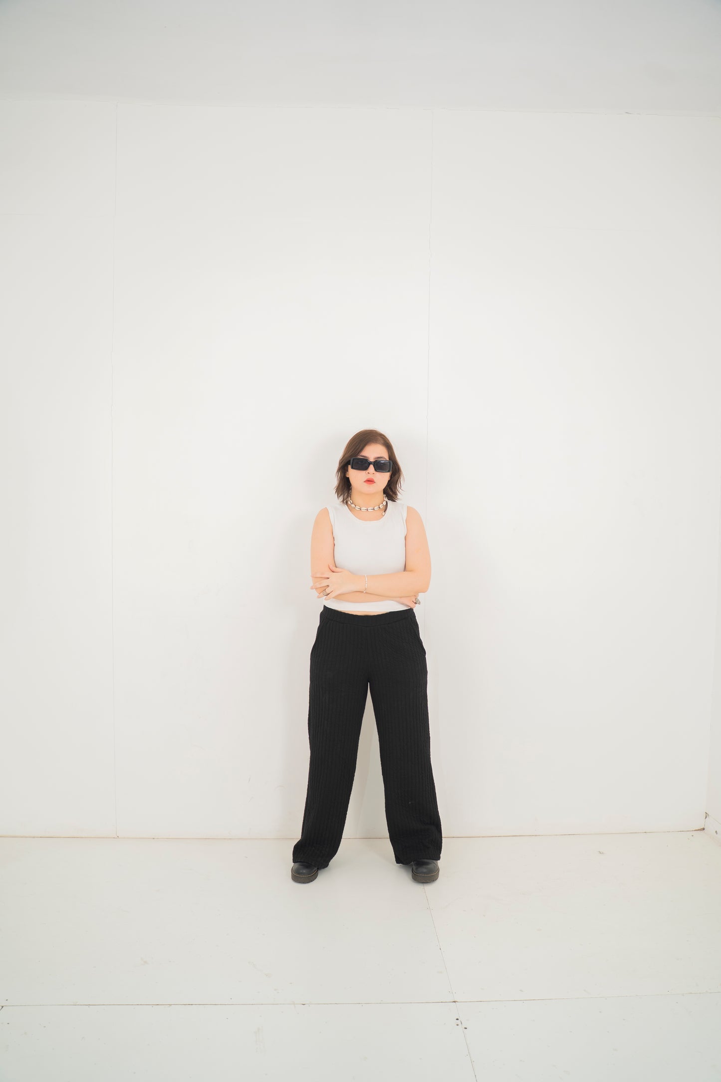 Black quilted trousers