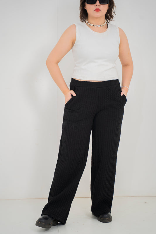 Black quilted trousers