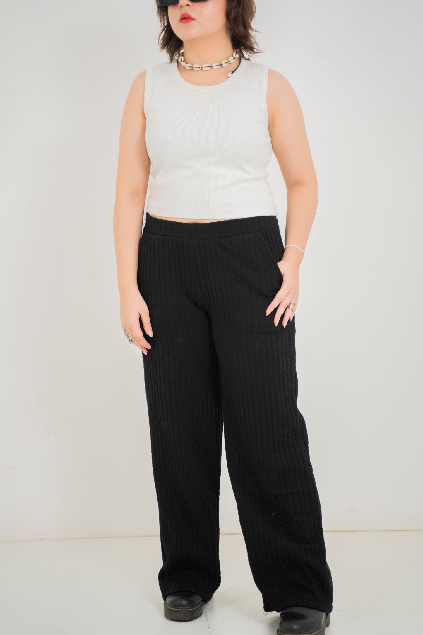 Black quilted trousers